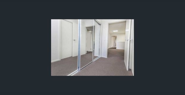 Modern Two-Bedroom Townhouse with Park Views and Prime Location - Photo 1