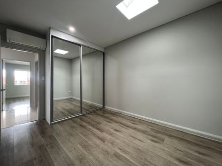 Spacious and Private 2 Bedroom Unit - Photo 2