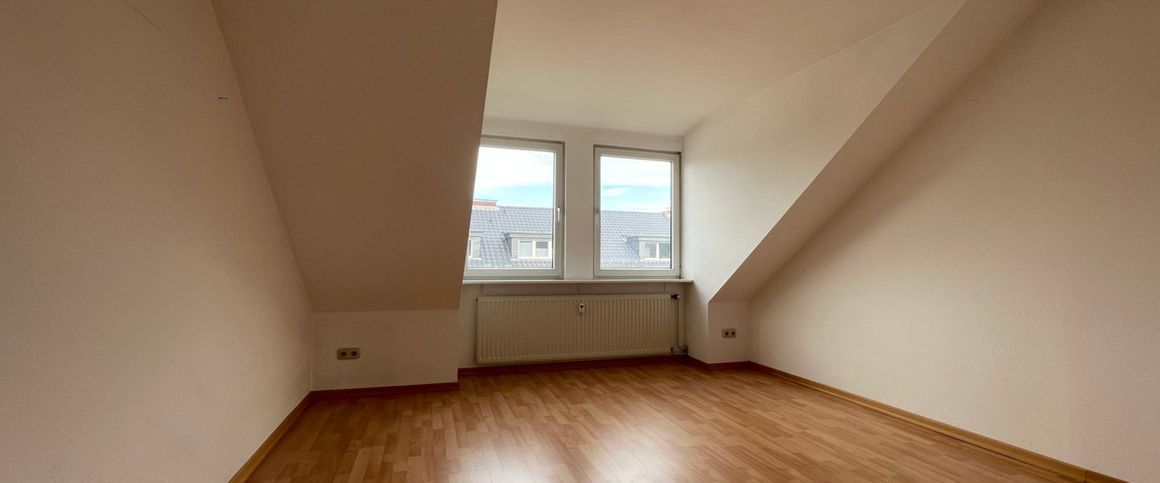 Tolle Dachgeschoss-Wohnung in zentraler Lage - Foto 1