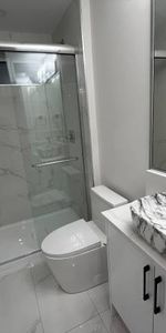 Brand New Spacious and bright 1 bedroom, 1-bathroom ground-level suite - Photo 4