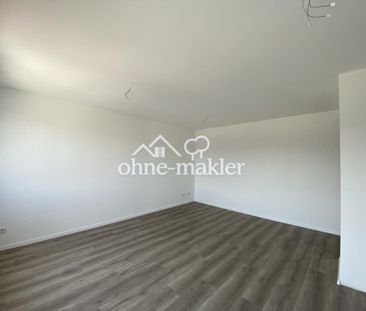 Lichtdurchflutete Neubauwohnung mit Einbauküche und großem Balkon i... - Photo 1