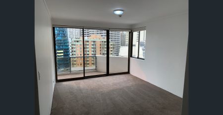 TOP FLOOR REFRESHED 2 BEDROOM APARTMENT WITH PARKING - Photo 2