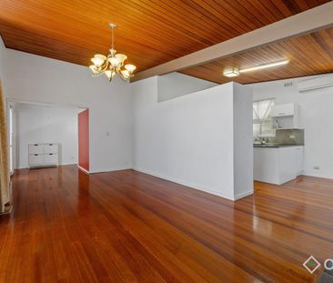 Charming 4-Bedroom Home with Spacious Backyard - Photo 1