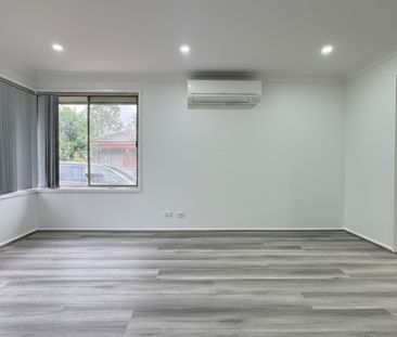 FRESHLY RENOVATED HOME OPPOSITE PARK | GARAGE & WORKSHOP! - Photo 3