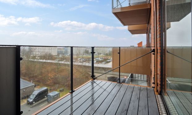 2-værelses lejlighed med solrig altan i en arkitekttegnet ejendom på Vallensbæk Stationstorv. - Foto 1