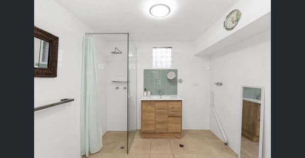 Coastal Living at Its Best – 2-Bedroom Unit Just Minutes from the Beach! - Photo 1