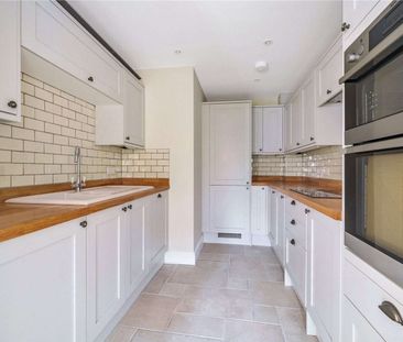 A beautifully presented three bedroom character property in a promi... - Photo 1