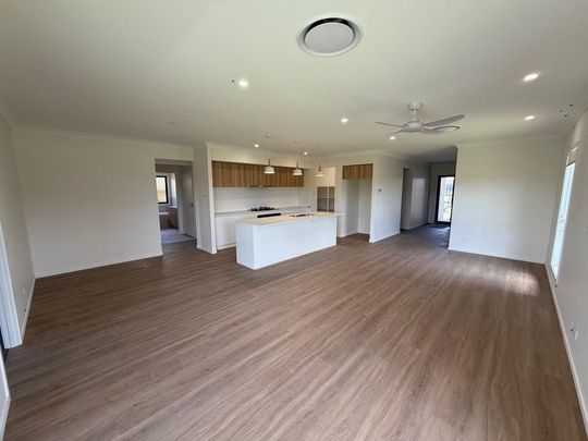 Spacious 4-Bedroom Family Home with Modern Features! - Photo 1