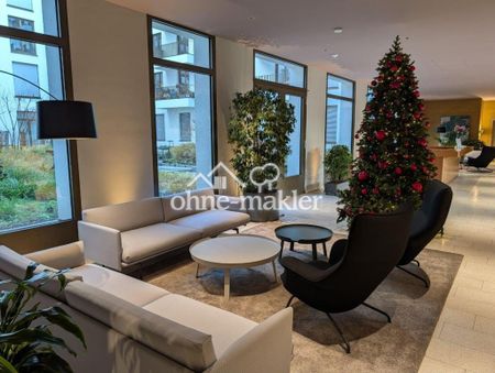 Exklusives Neubau-Apartment im "PURE Living" mit Wasserblick - Photo 3