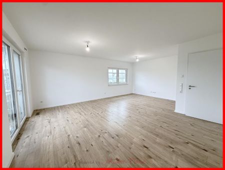 Modernes Wohnen auf zwei Etagen: Hochwertige Maisonettewohnung mit viel Licht und Balkon! - Foto 2