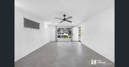 THREE BEDROOM FAMILY HOME IN BIRKDALE WITH A LARGE FULLY FENCED REAR YARD - Photo 5