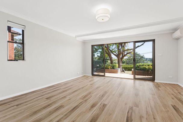 Beautifully Renovated & Convenient Living in the Heart of Abbotsford - Photo 1