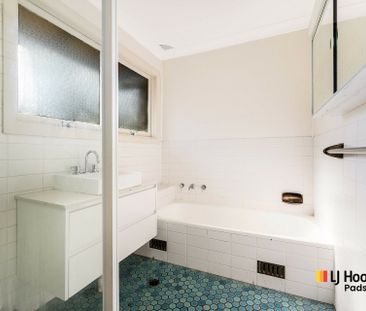 Spacious Two-Bedroom Townhouse in Peaceful, Convenient Location - Photo 4