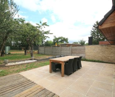 Instapklare woning (2004) met zonnepanelen en idyllische tuin - Photo 3