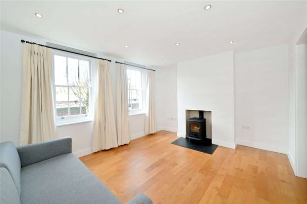 Charming two bedroom terraced house with private outdoor space - Photo 1