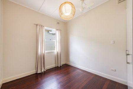 Well-Kept 3-Bedroom Home with Shed & Sunroom in Quiet Location - Photo 4