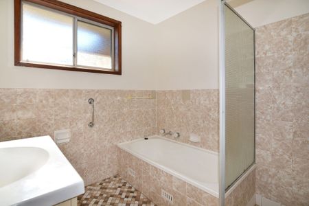 CONVENIENTLY LOCATED TWO BEDROOM VILLA - Photo 4