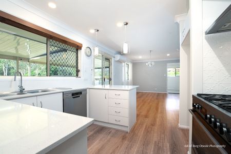 Spacious Acreage Retreat with Solar, Stables & Dam - Photo 5