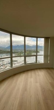 Stunning Renovation & Waterfront Views! 2 Bed Plus Den! - Photo 1