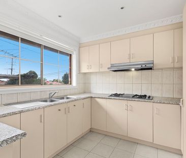 IDEALLY LOCATED THREE BEDROOM UNIT - Photo 5