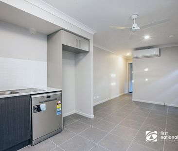 QUIET AND PEACEFUL LIVING IN LOGAN RESERVE - Photo 1