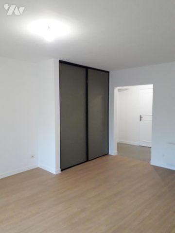 APPARTEMENT T3 avec PARKING EXTERIEUR PRIVATIF- LAVAL - Photo 2