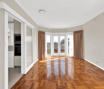 Spacious Three Bedroom Brick Home with Multiple Living Areas and Am... - Photo 2