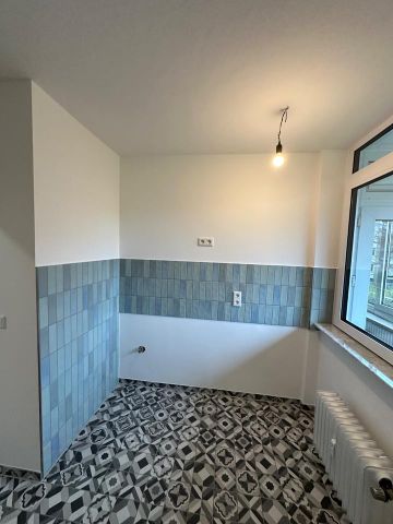 Helle 70 qm Zwei-Zimmer-Wohnung mit Südbalkon in ruhiger Lage - Photo 4