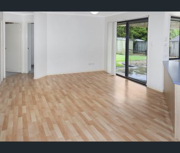 ELEVATED FAMILY HOME WITH GREAT YARD - Photo 2