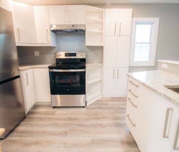 ** NEWLY RENOVATED ** 3 BEDROOM APARTMENT IN ST. CATHARINES!! - Photo 2