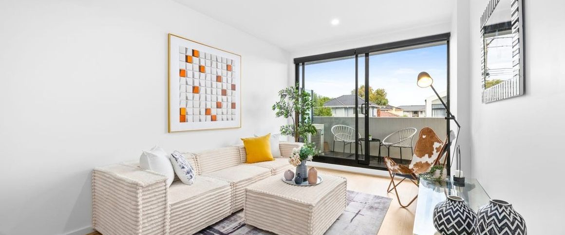 Elevated Living in the McKinnon Secondary College Zone - Photo 1