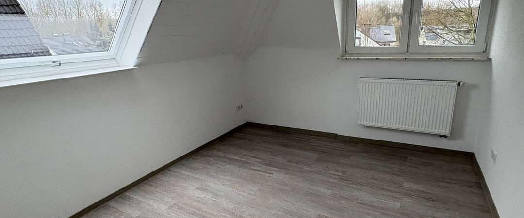 Modernisierte Dachgeschoss-Wohnung in Dortmund-Barop - Foto 1