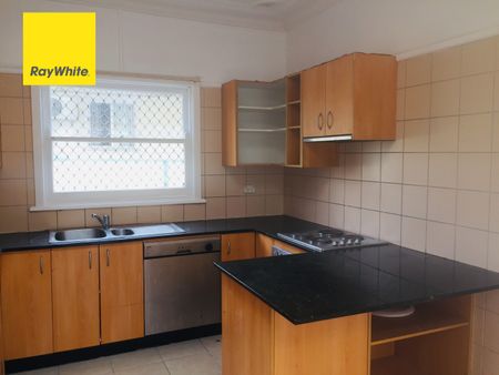 Spacious 4-Bedroom Home in a Convenient Location! - Photo 5