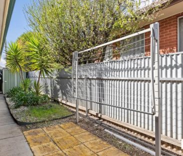 Modern 2-Bedroom Unit with Low-Maintenance Yard - Photo 6