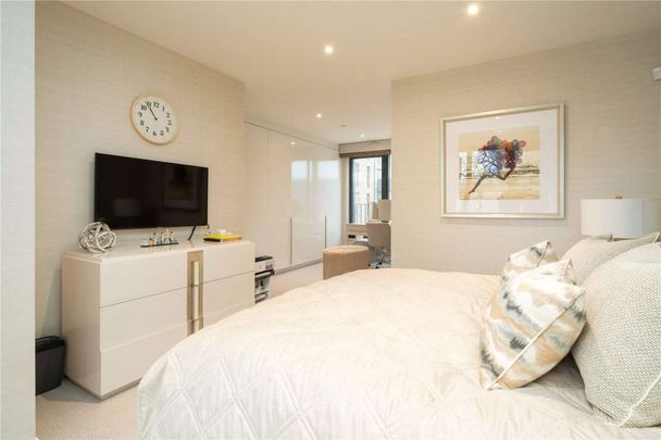 A contemporary four bedroom townhouse in a popular modern development in Southfields. - Photo 1