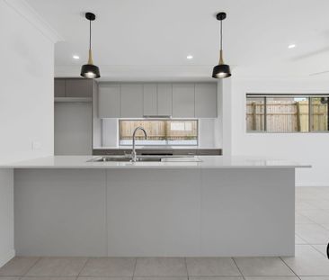 Beautiful Brand-New 4-Bedroom Home in a Prime Brassall Location - Photo 4