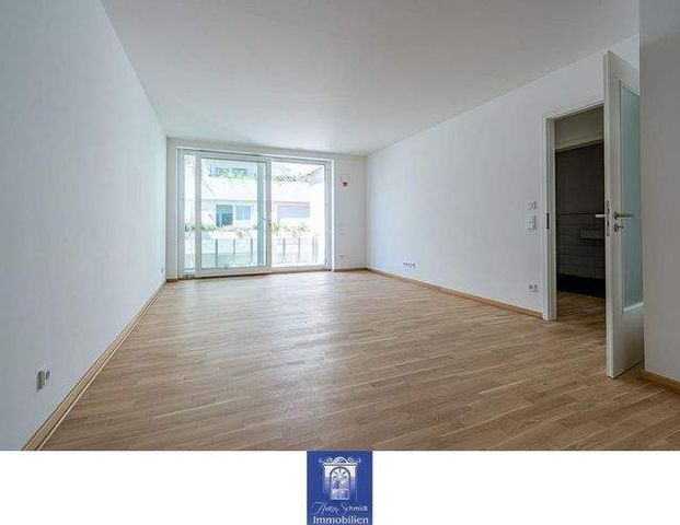 Charmante Neubauwohnung mit hofseitigem Balkon, Fußbodenheizung, EBK, Gäste-WC! - Foto 1