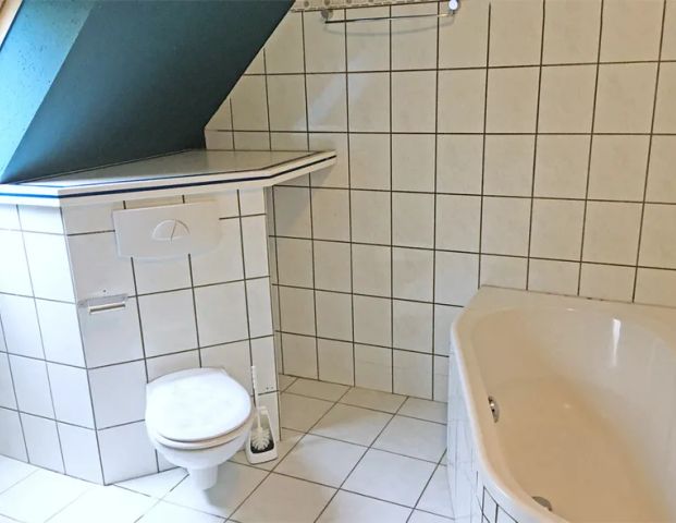 Dachgeschosswohnung mit Extras! - Foto 1