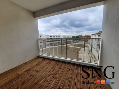 T2 AVEC LOGGIA ET UN PARKING COUVERT - Photo 3