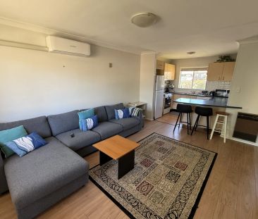 Conveniently Located 2-Bedroom Unit with Garage - Photo 1