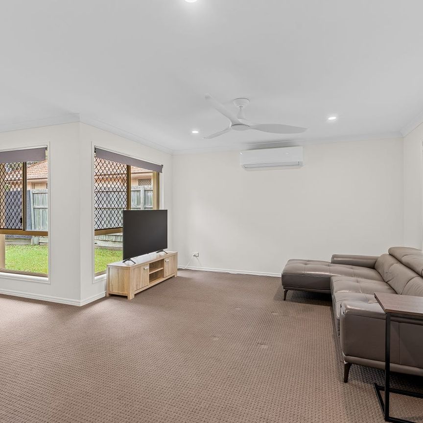 4-Bed, 2-Bath Family Home with Direct Park Access Within the Stretton State College Catchment - Photo 1