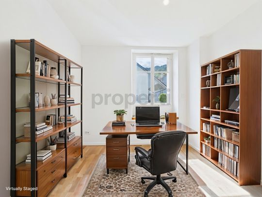 Charming 3.5-room apartment in a listed building in Büsserach - Photo 1