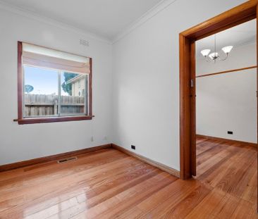 Comfortable 4-Bedroom Home in a Sought-After Location - Photo 2