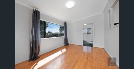 Spacious 5-Bedroom Family Home in Convenient Location - Photo 5