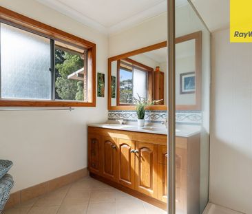 Spacious High-Set Brick Home with Pool & Entertaining - Photo 6