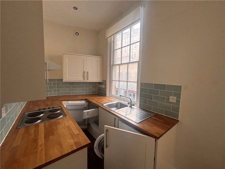 A period apartment located in a prime Bath location set just off Walcot Street featuring one generously sized bedroom, a modern kitchen, and a shower room. - Photo 3