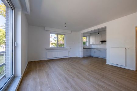 Gezellig gelijkvloers appartement met tuin! - Photo 2