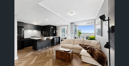 A Statement in Style | Exquisitely Renovated CBD Apartment with Spectacular Views - Photo 2