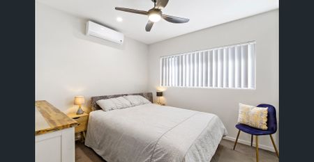 Stylish Two-Bedroom Apartment Close to CBD - Photo 2