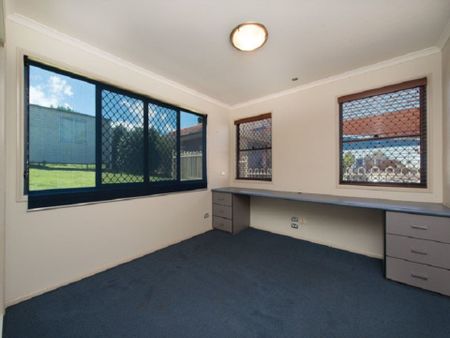 The Whole Package! Spacious 5-Bedroom Home + Sheds Galore! - Photo 5